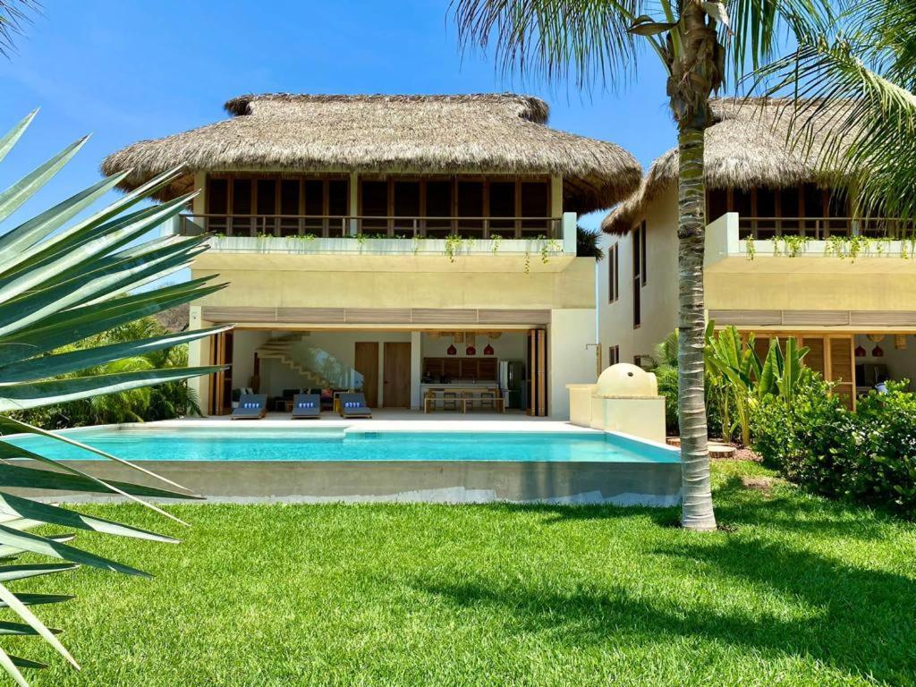 Eco Villas La Flia ปูแอร์โตเอสกอนดิโด ภายนอก รูปภาพ